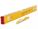 Two yellow spirit levels with red end caps; the larger one is rectangular and placed upright, while the smaller one lies flat in front of it. Both have bubble vials for horizontal and vertical leveling.