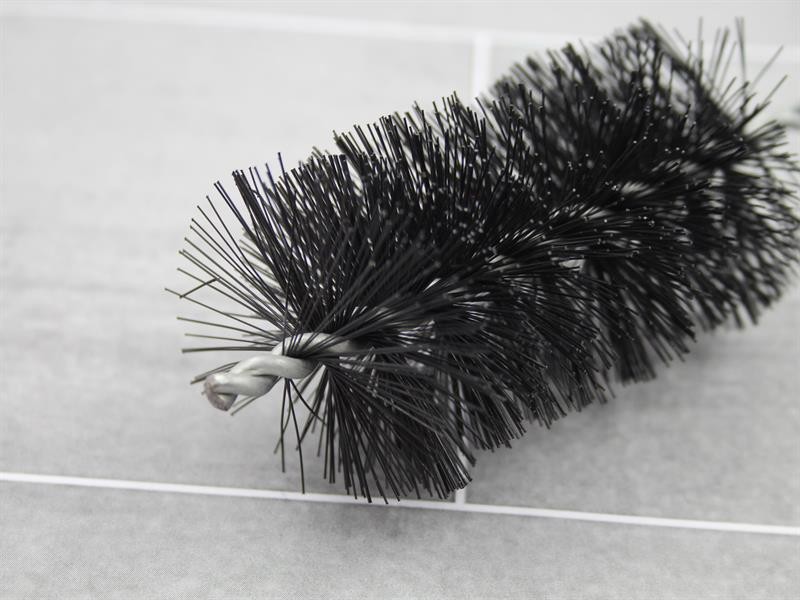 A brush with natural or synthetic bristles and an ergonomic handle, for applying coatings or cleaning surfaces.