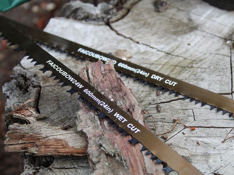 A saw with a hardened blade and a comfortable handle, for cutting timber, metal, or masonry.