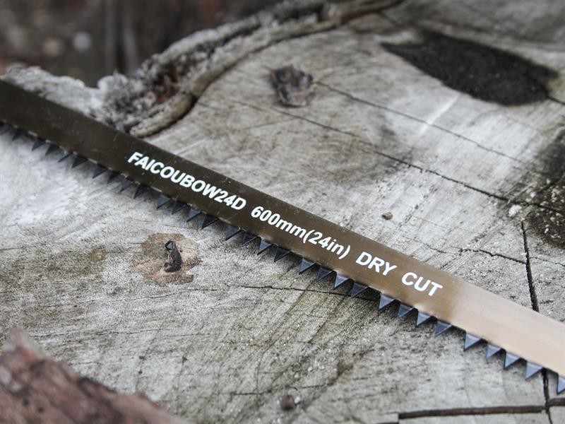 A saw with a hardened blade and a comfortable handle, for cutting timber, metal, or masonry.