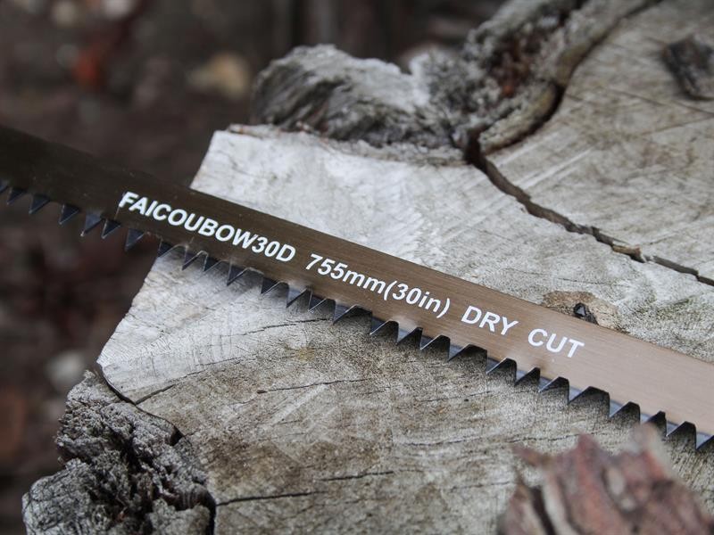 A saw with a hardened blade and a comfortable handle, for cutting timber, metal, or masonry.