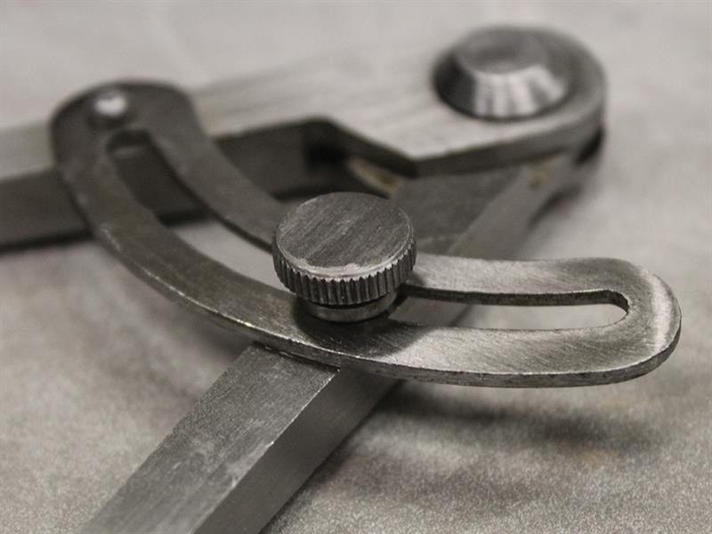A precision steel try square with a hardened blade and a machined stock, used for checking and marking right angles in woodworking and metalwork.