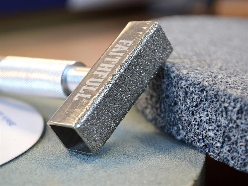 A Faithfull hand tool with a metal working end and an ergonomic handle, designed for general construction and maintenance tasks.