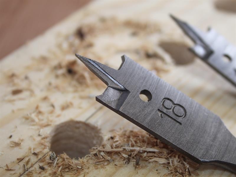 A metal concrete screw anchor with a partially threaded shaft and a drill point tip, designed for direct fixing into pre-drilled holes in concrete or masonry.