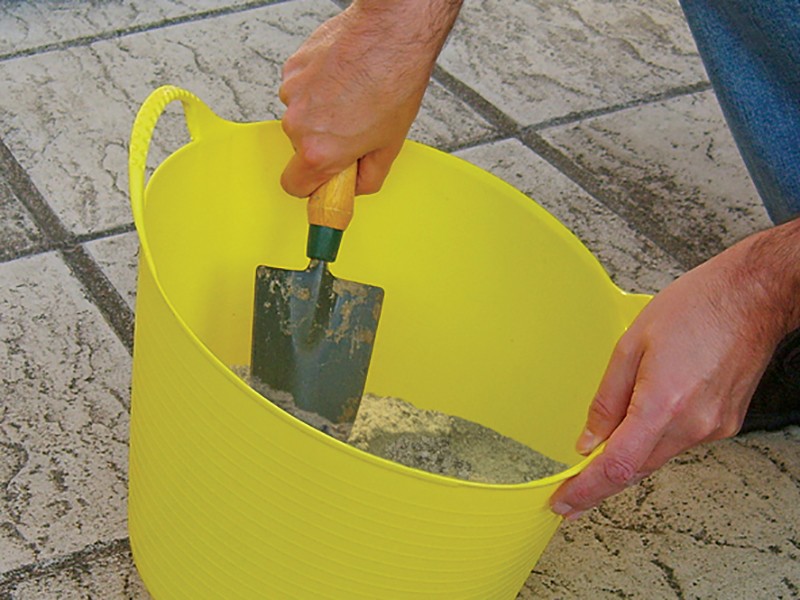 A Faithfull hand tool with a metal working end and an ergonomic handle, designed for general construction and maintenance tasks.