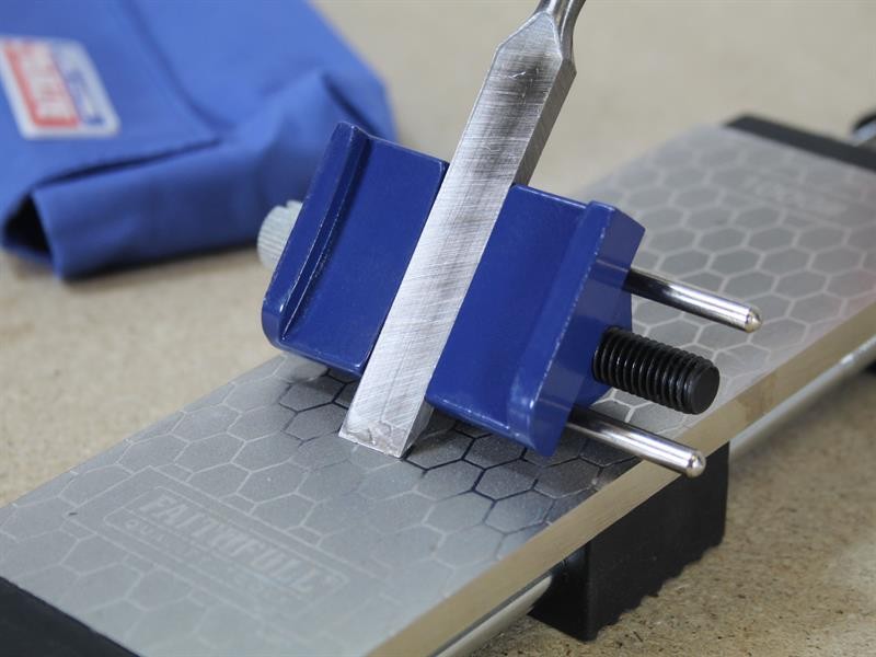 A Faithfull hand tool with a metal working end and an ergonomic handle, designed for general construction and maintenance tasks.