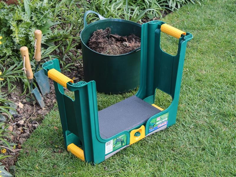 A Faithfull garden tool with a steel working head and a wooden or composite handle, for general landscaping and maintenance tasks.