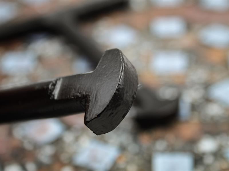 A Faithfull hand tool with a metal working end and an ergonomic handle, designed for general construction and maintenance tasks.