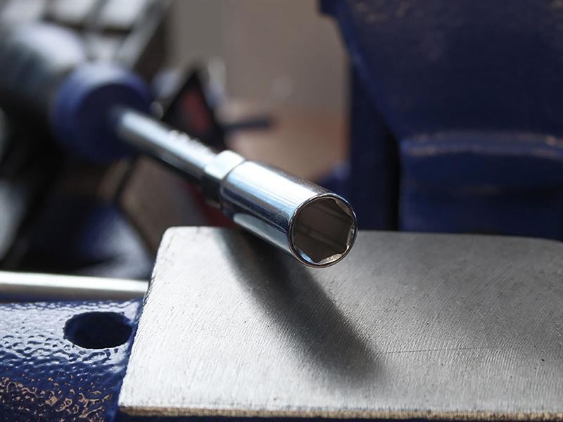 A steel hex nut with an internally threaded profile, for use with a matching bolt or threaded rod.