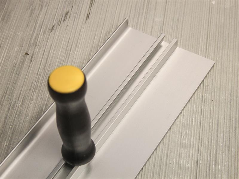 A Faithfull hand tool with a metal working end and an ergonomic handle, designed for general construction and maintenance tasks.