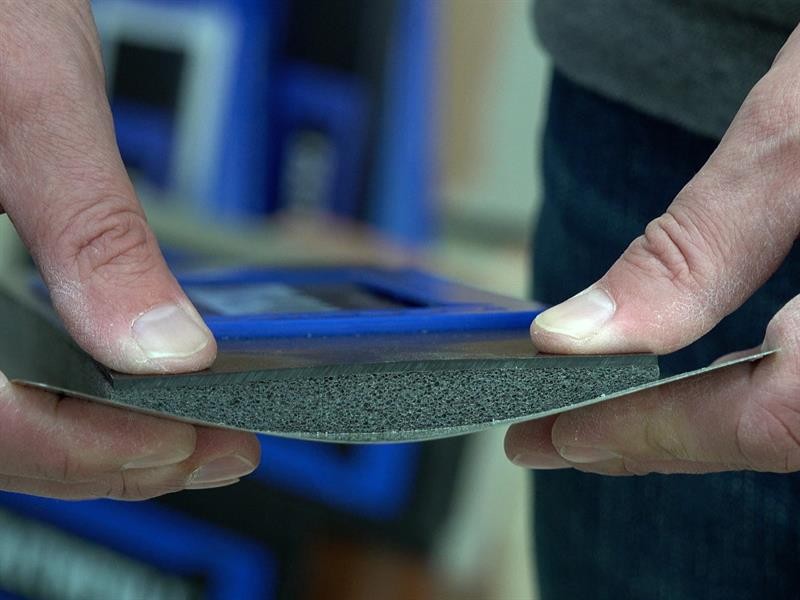 A Faithfull trowel with a polished steel blade and an ergonomic handle, for applying and finishing mortar, plaster, and adhesive.