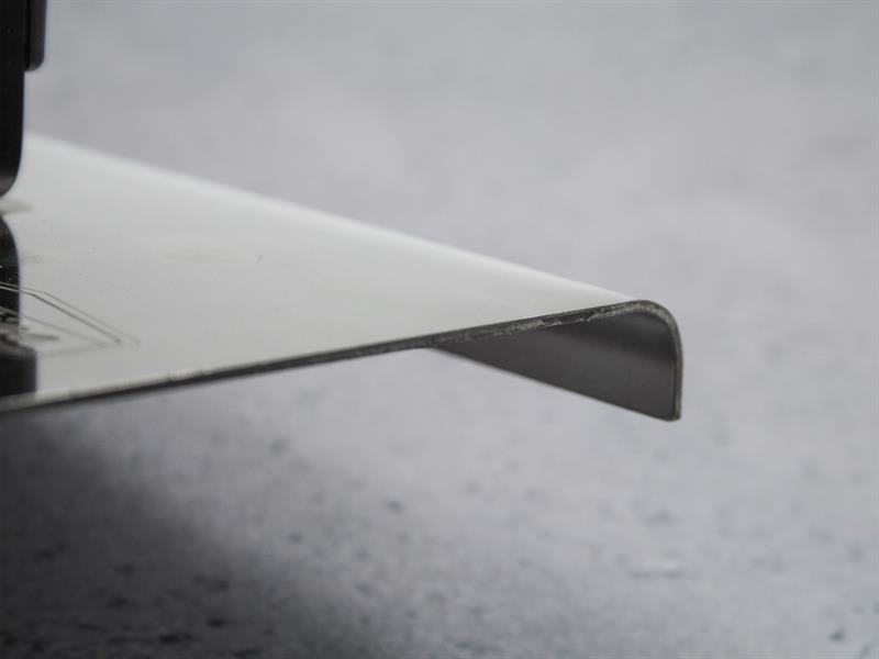 A Faithfull trowel with a polished steel blade and an ergonomic handle, for applying and finishing mortar, plaster, and adhesive.