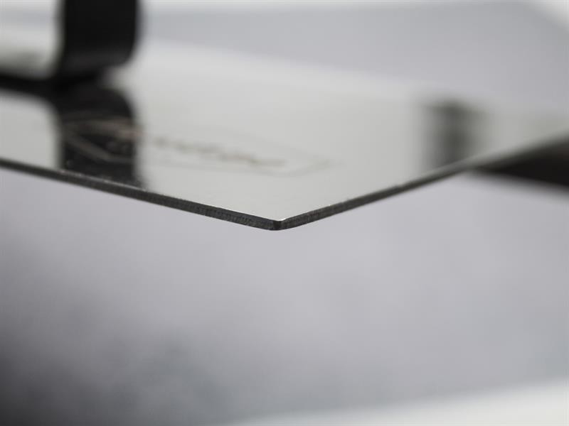 A Faithfull trowel with a polished steel blade and an ergonomic handle, for applying and finishing mortar, plaster, and adhesive.