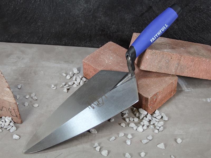 A Faithfull trowel with a polished steel blade and an ergonomic handle, for applying and finishing mortar, plaster, and adhesive.