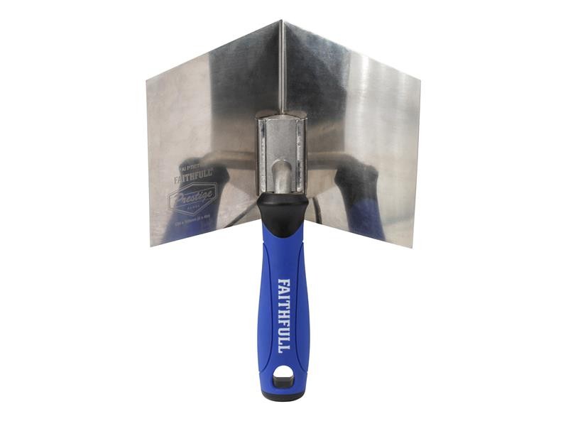 A Faithfull trowel with a polished steel blade and an ergonomic handle, for applying and finishing mortar, plaster, and adhesive.