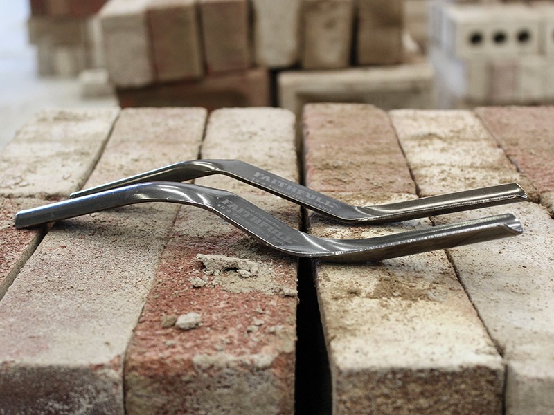 A Faithfull hand tool with a metal working end and an ergonomic handle, designed for general construction and maintenance tasks.