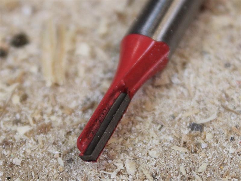 A Faithfull plunge router with a fine depth adjuster and a guide fence, for cutting grooves, rebates, and profiles in timber.