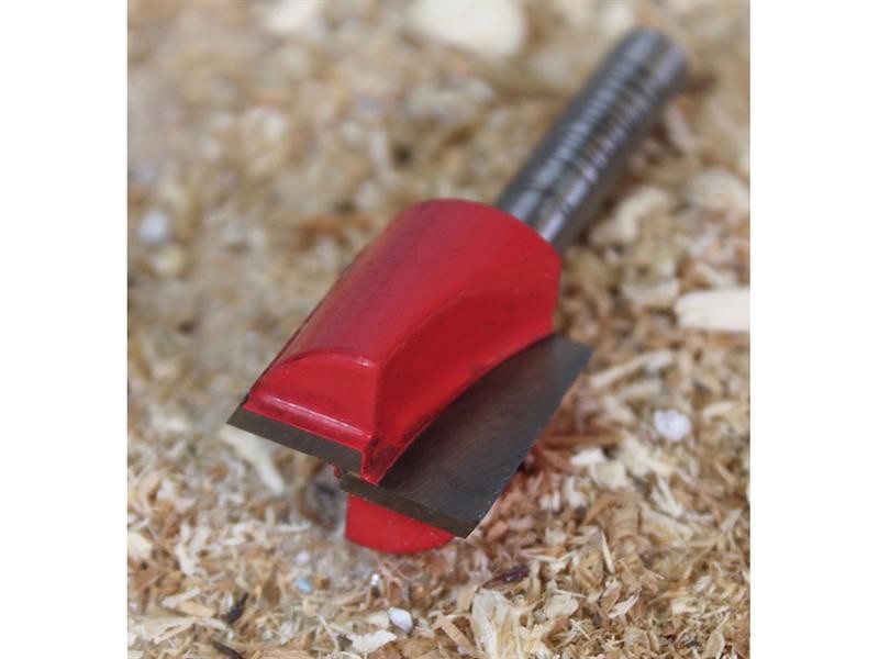 A Faithfull plunge router with a fine depth adjuster and a guide fence, for cutting grooves, rebates, and profiles in timber.