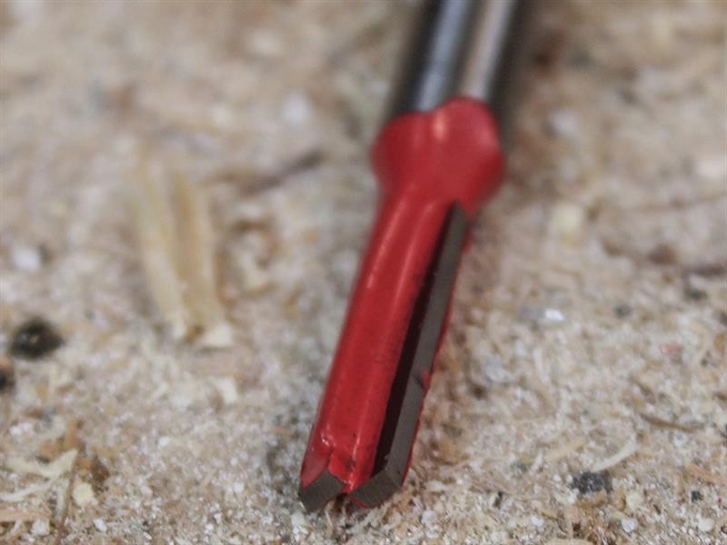 A Faithfull plunge router with a fine depth adjuster and a guide fence, for cutting grooves, rebates, and profiles in timber.