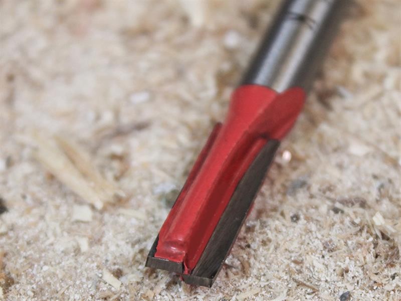 A Faithfull plunge router with a fine depth adjuster and a guide fence, for cutting grooves, rebates, and profiles in timber.