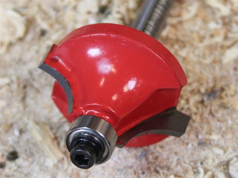A Faithfull plunge router with a fine depth adjuster and a guide fence, for cutting grooves, rebates, and profiles in timber.