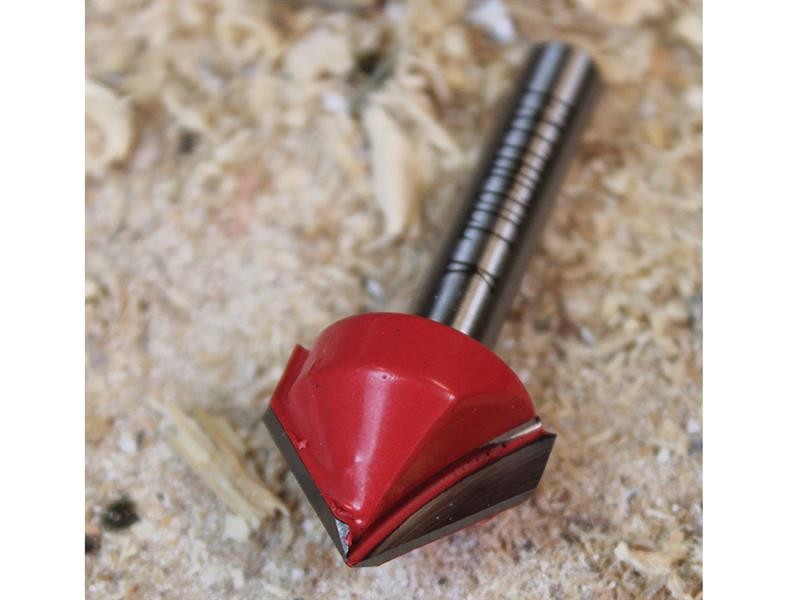 A Faithfull plunge router with a fine depth adjuster and a guide fence, for cutting grooves, rebates, and profiles in timber.