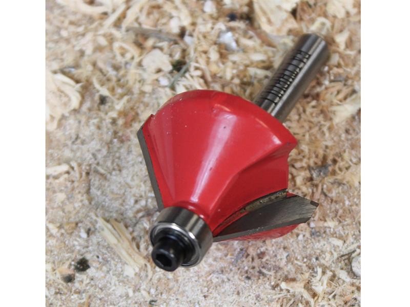 A Faithfull plunge router with a fine depth adjuster and a guide fence, for cutting grooves, rebates, and profiles in timber.
