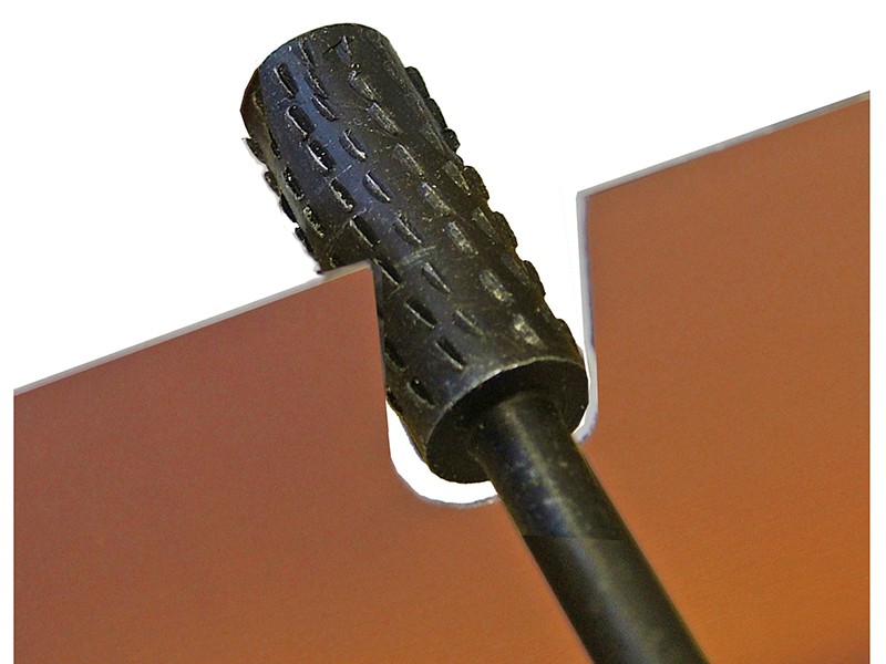 A Faithfull needle file with a hardened steel abrasive surface and a turned wooden or synthetic handle, for shaping and deburring metal.