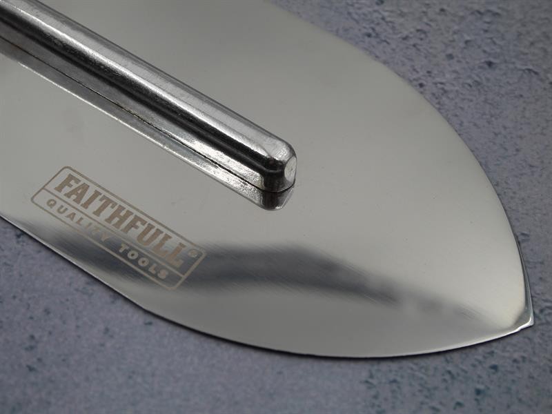 A Faithfull trowel with a polished steel blade and an ergonomic handle, for applying and finishing mortar, plaster, and adhesive.