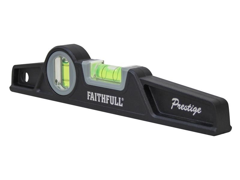A black Faithfull Prestige spirit level with two green bubble vials, used for checking horizontal and vertical alignment. The tool has a hole at one end for hanging.