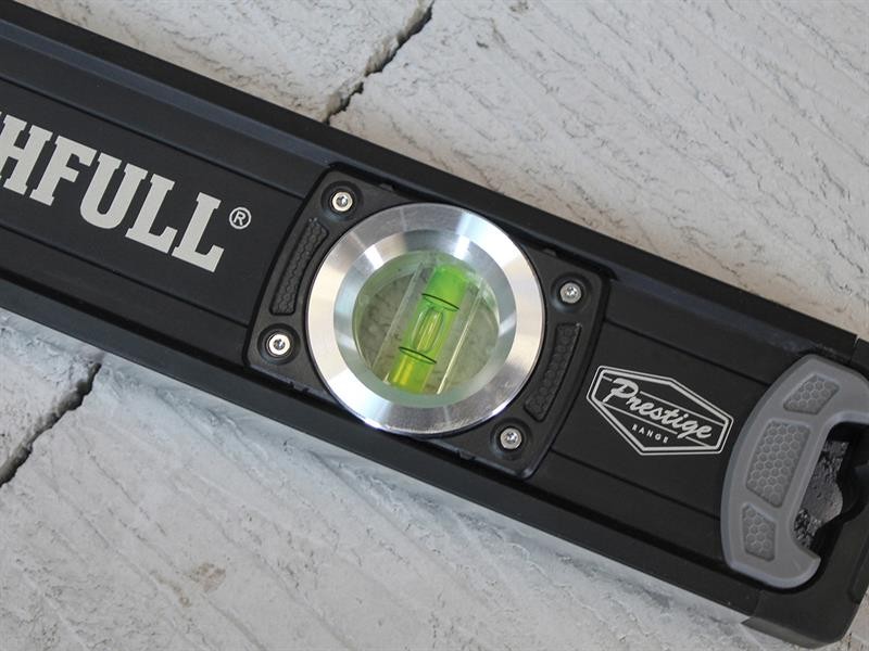 A Faithfull 60cm spirit level with an extruded aluminium body and accurate vials, for checking horizontal and vertical alignment.