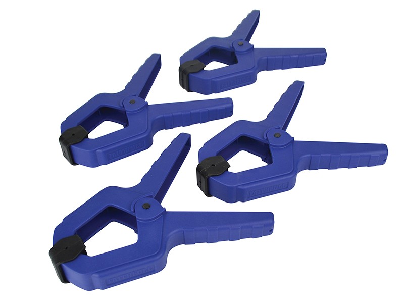 A spring clamp with a plastic or steel body and non-slip pads, for quickly holding lightweight assemblies and sheets.