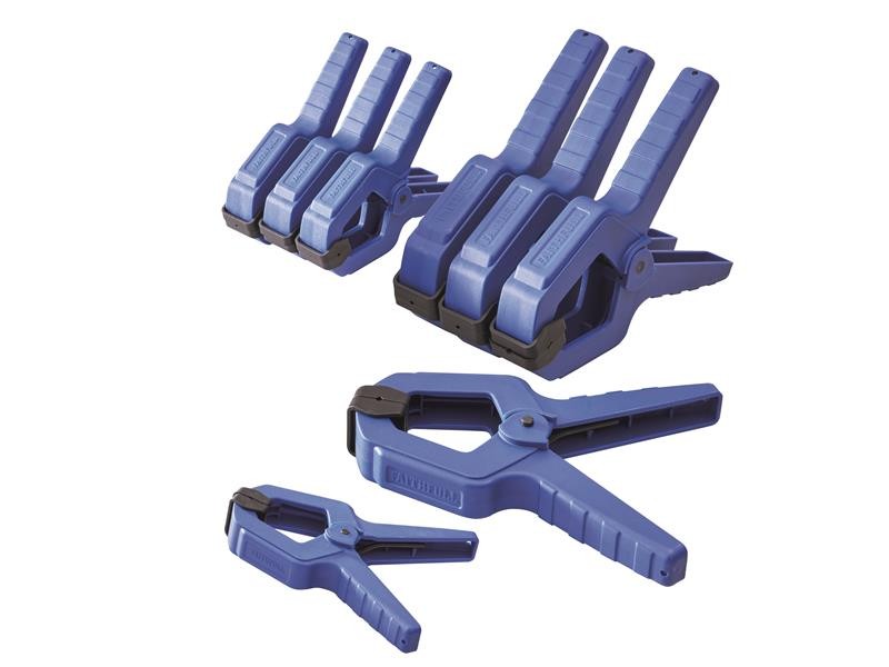 A spring clamp with a plastic or steel body and non-slip pads, for quickly holding lightweight assemblies and sheets.