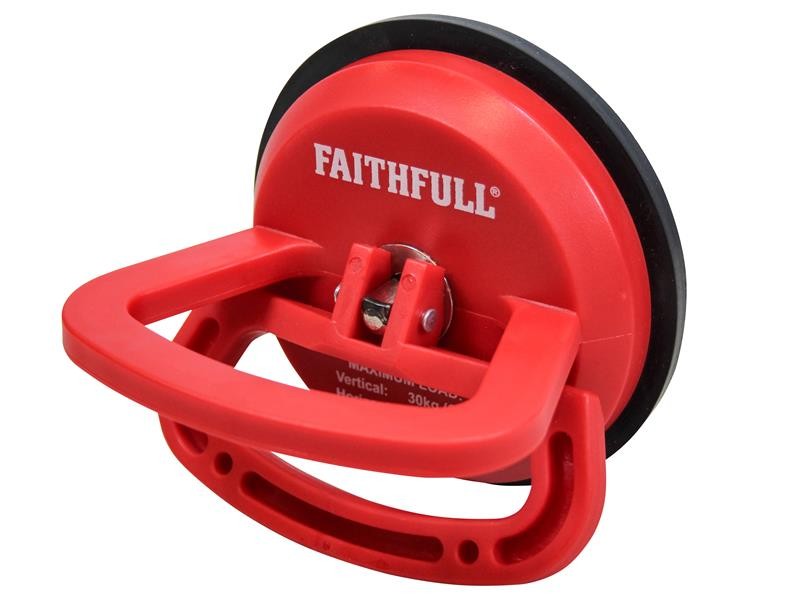 A red Faithfull brand suction cup lifter with a black rubber base and a handle, used for lifting and carrying glass or smooth surfaces.