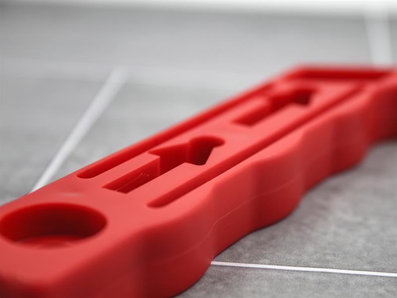 A cutting knife with a steel blade and an ergonomic handle, for general site and workshop use.