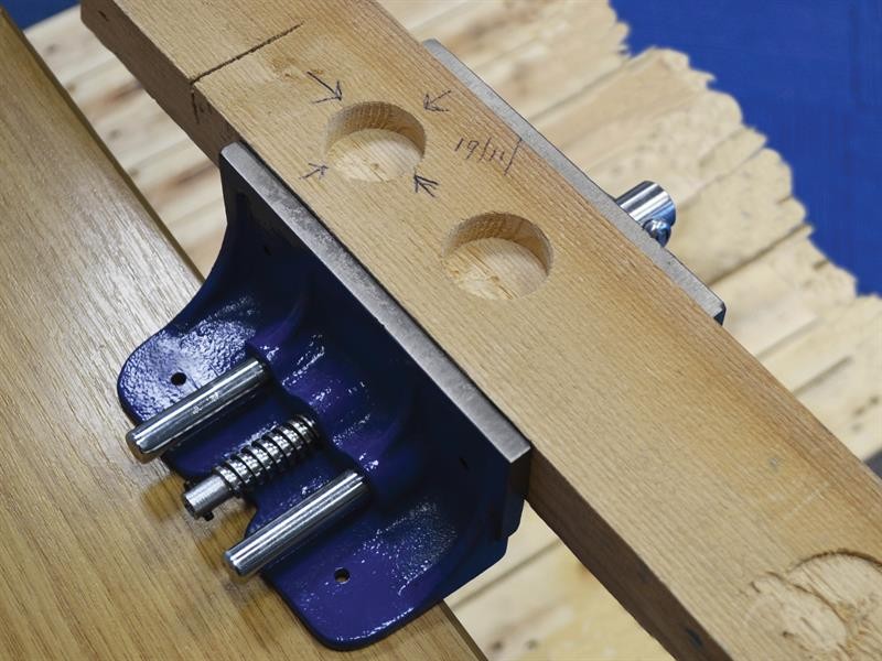 A Faithfull clamp with an adjustable jaw and a screw-tightening mechanism, for holding workpieces in position during cutting, drilling, or bonding.