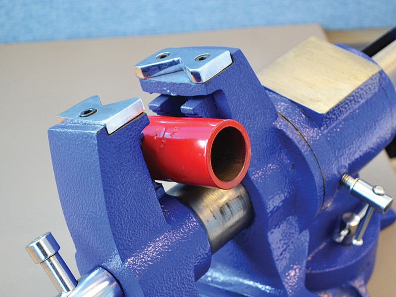 A Faithfull clamp with an adjustable jaw and a screw-tightening mechanism, for holding workpieces in position during cutting, drilling, or bonding.