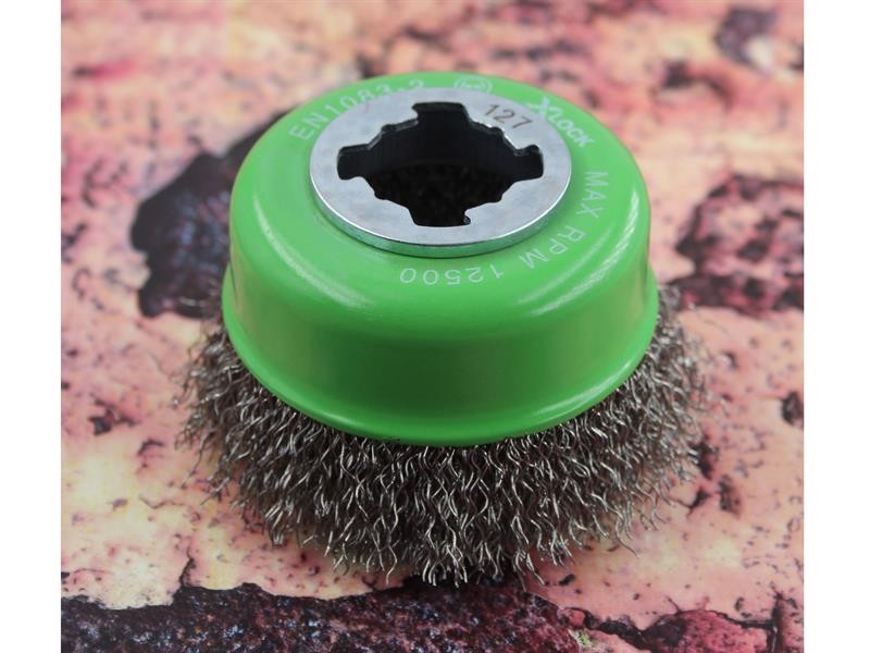 A brush with natural or synthetic bristles and an ergonomic handle, for applying coatings or cleaning surfaces.