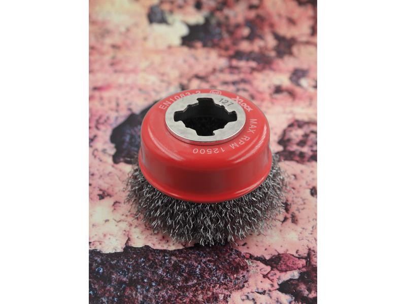 A brush with natural or synthetic bristles and an ergonomic handle, for applying coatings or cleaning surfaces.