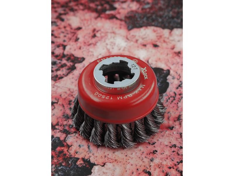 A brush with natural or synthetic bristles and an ergonomic handle, for applying coatings or cleaning surfaces.