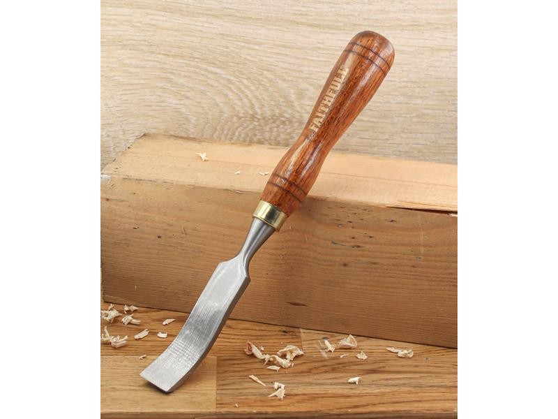 A hardened steel chisel with a bevelled cutting edge and a square-section body, for cutting stone, brick, or timber.
