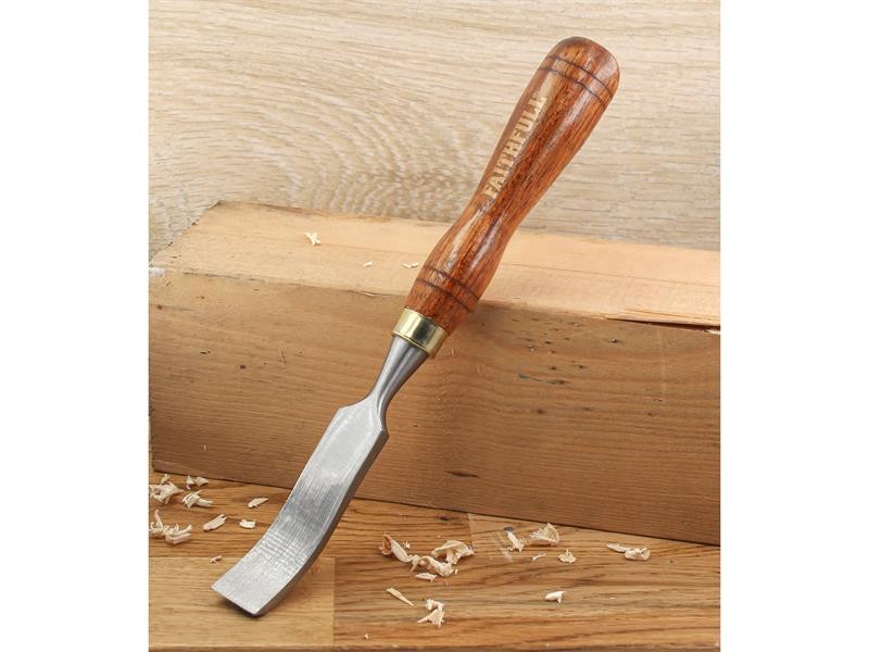 A hardened steel chisel with a bevelled cutting edge and a square-section body, for cutting stone, brick, or timber.