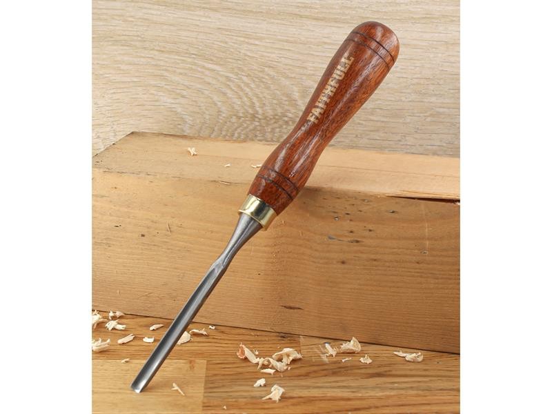 A hardened steel chisel with a bevelled cutting edge and a square-section body, for cutting stone, brick, or timber.