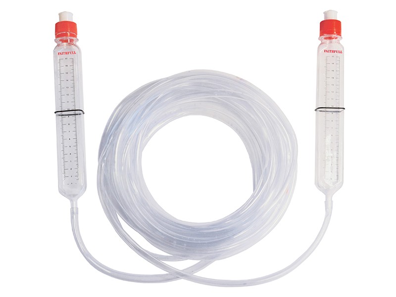 A water level kit with transparent flexible tubing, for transferring a level datum over long distances or around obstructions.