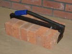 A Faithfull hand tool with a metal working end and an ergonomic handle, designed for general construction and maintenance tasks.