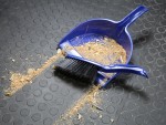 A brush with natural or synthetic bristles and an ergonomic handle, for applying coatings or cleaning surfaces.