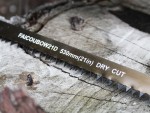 A saw with a hardened blade and a comfortable handle, for cutting timber, metal, or masonry.