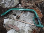 A saw with a hardened blade and a comfortable handle, for cutting timber, metal, or masonry.