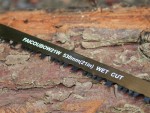 A saw with a hardened blade and a comfortable handle, for cutting timber, metal, or masonry.