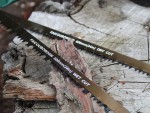 A saw with a hardened blade and a comfortable handle, for cutting timber, metal, or masonry.